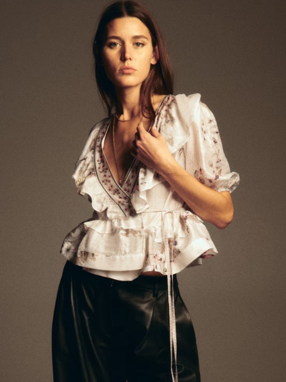 LINEN-BLEND PEPLUM TOP (worn only in a photo shoot).